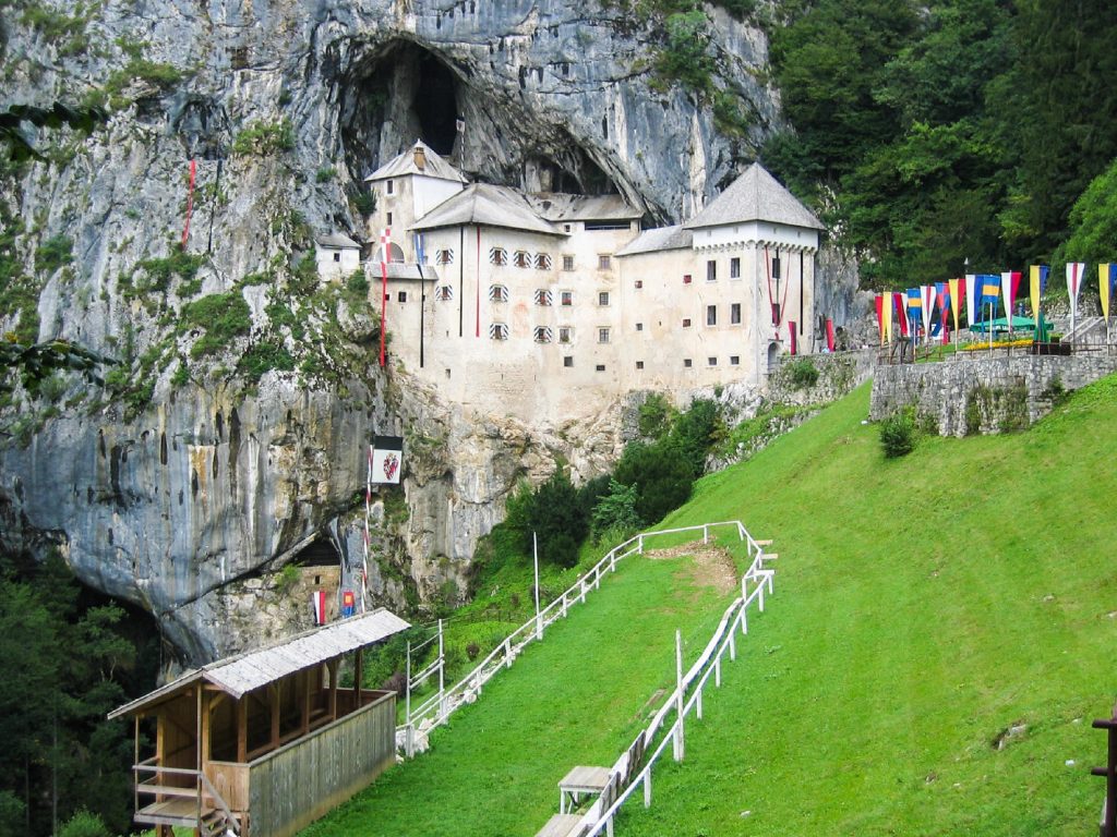Predjama Castle built into a limestone cliff in Slovenia